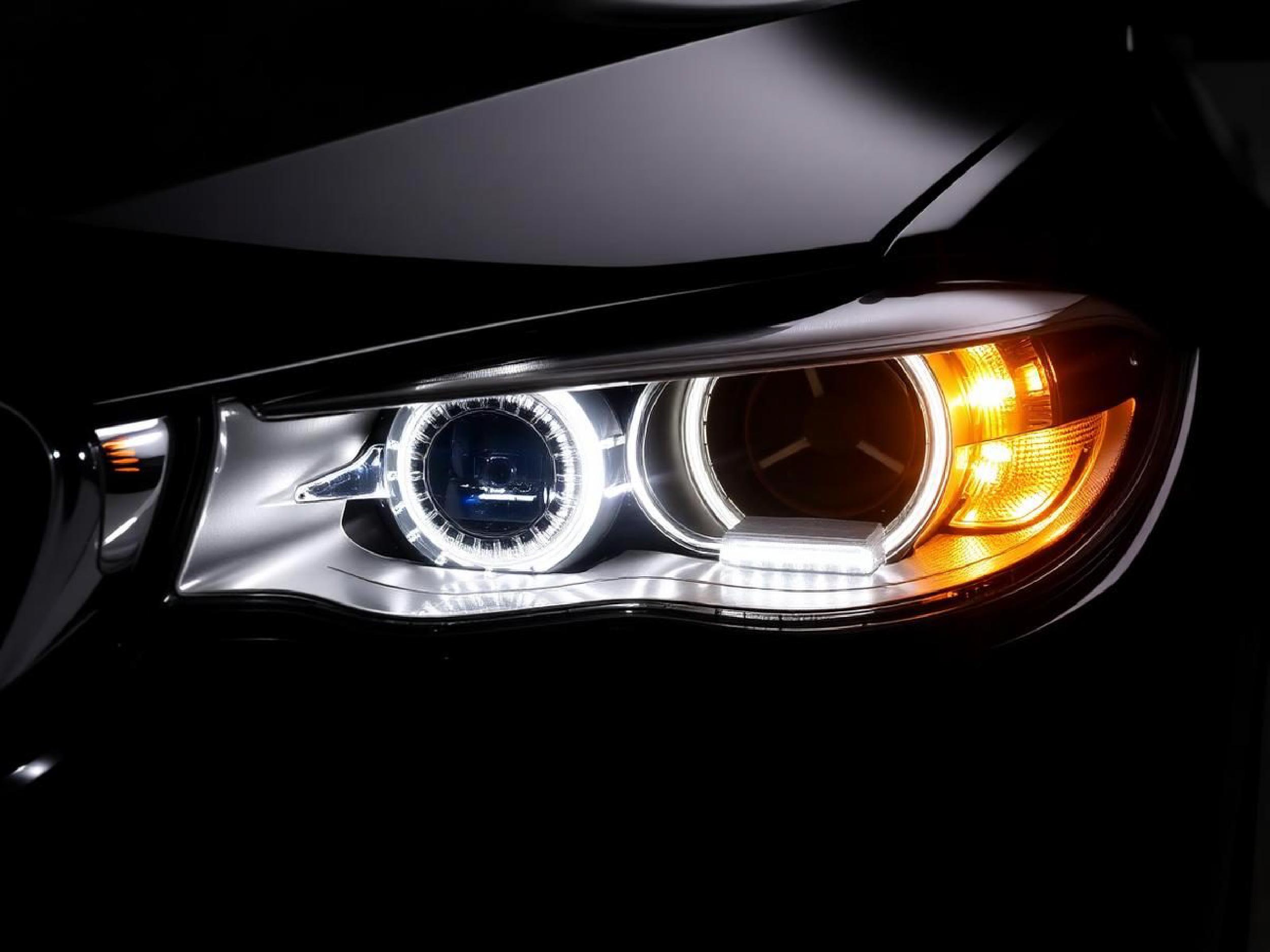 Completed luxury vehicle with bright headlights